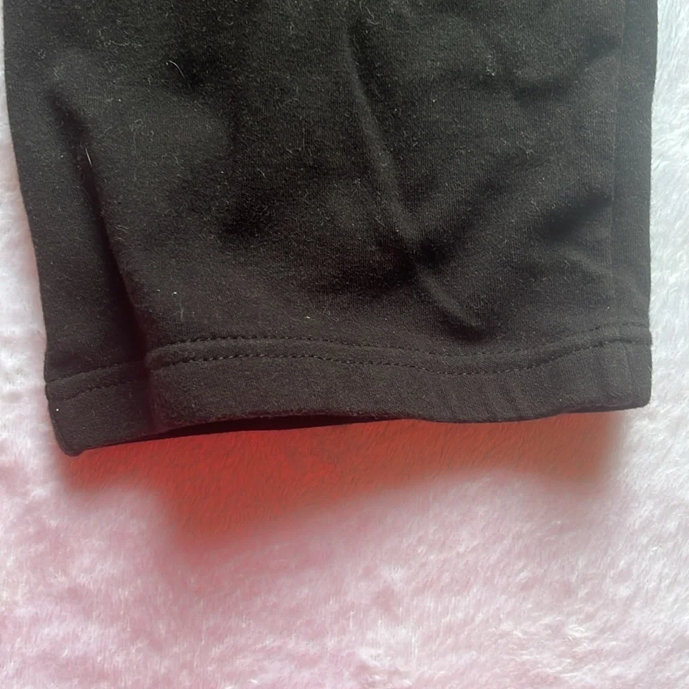 Black baby gown with gold heart and‎ bow detail